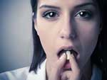 Woman taking depression medication.